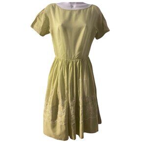 Vintage 1950s lime green dress with white embroidery.